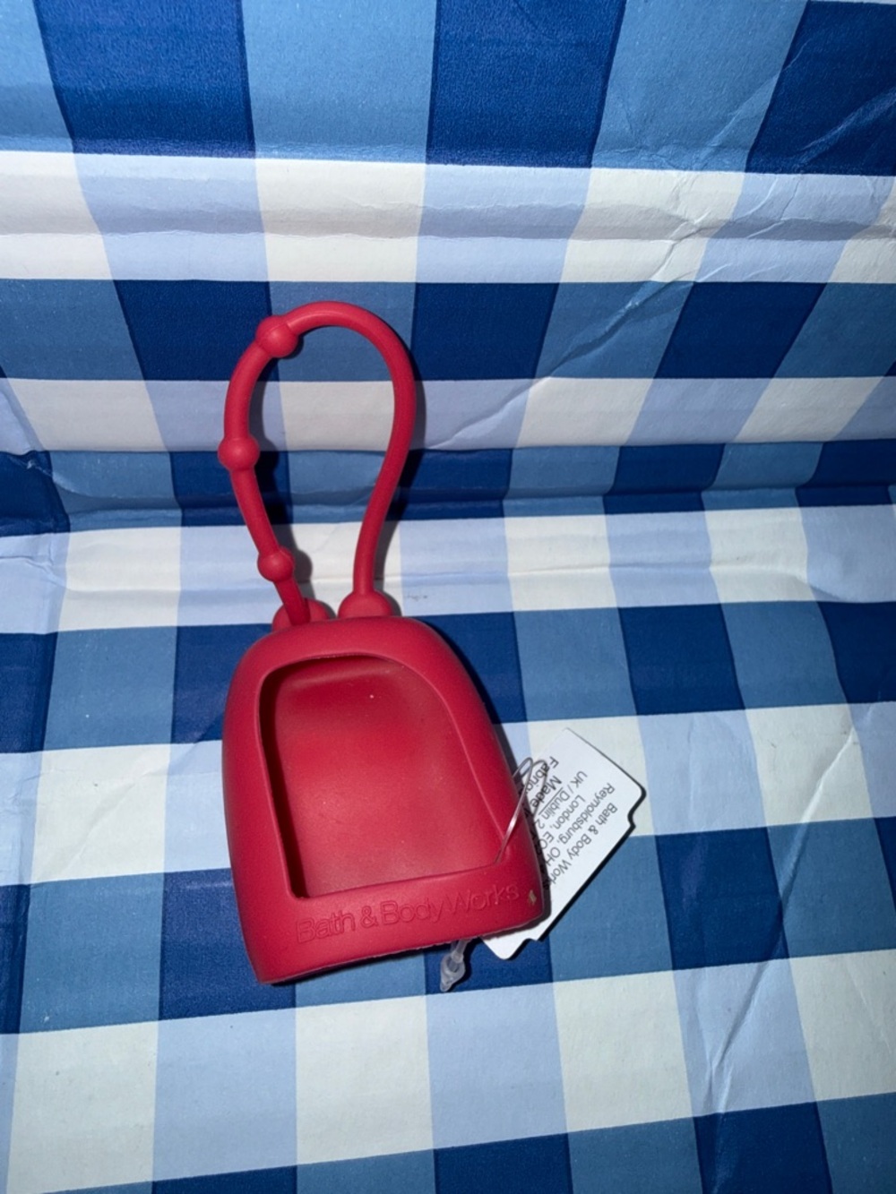 Pink hand sanitizer holder